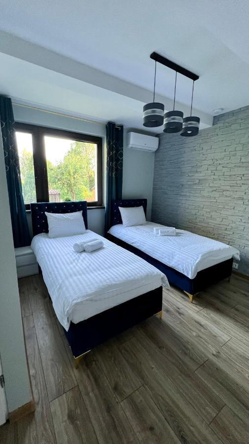 Aparthotel W Dolinie Stawow Zator By Housine Las Buitenkant foto