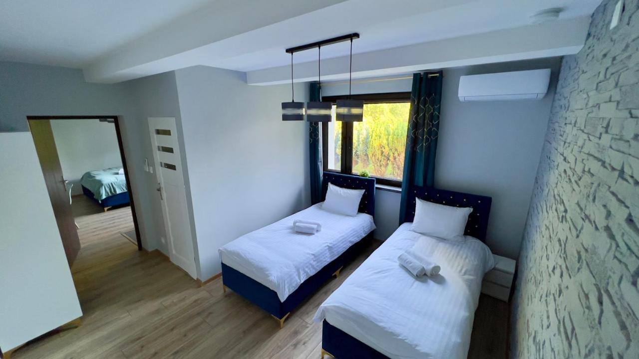 Aparthotel W Dolinie Stawow Zator By Housine Las Buitenkant foto